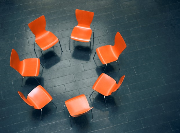 Group Therapy Orange Chairs in a Circle